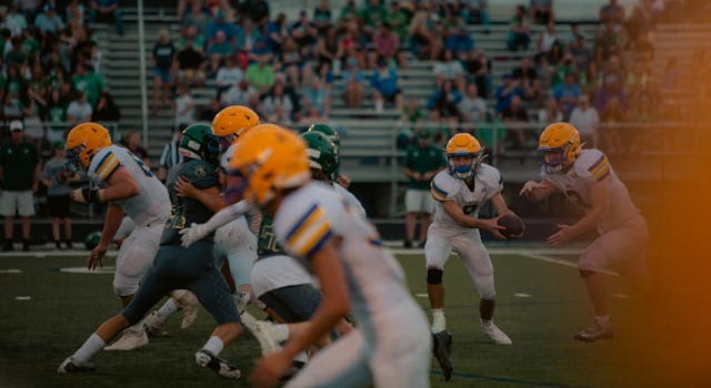 Running back som får en handoff från quarterbacken